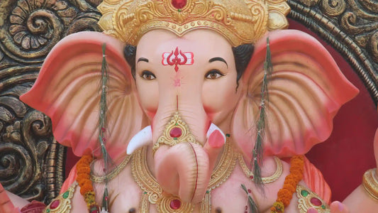 Aarti Gajvadan Vinayak Idol Decorated with Flowers and Bright Colors for Festive Celebrations