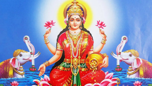 Colorful depiction of Goddess Lakshmi surrounded by elephants and lotus flowers, symbolizing Ashtalakshmi Stotram