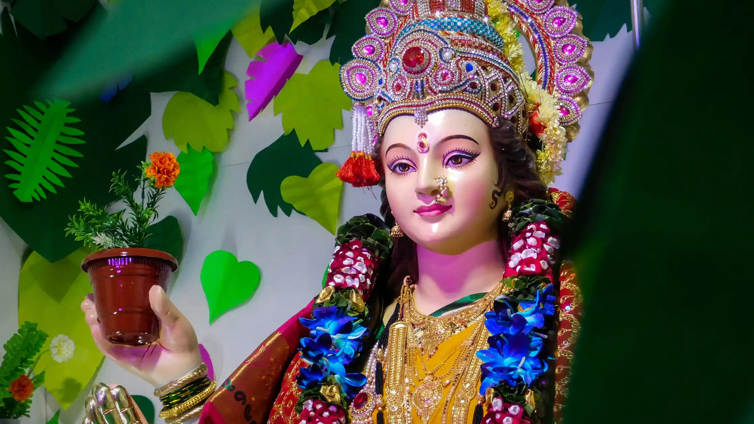 Vibrant depiction of Rigvedoktam Devi Suktam with intricate decorations and floral accents