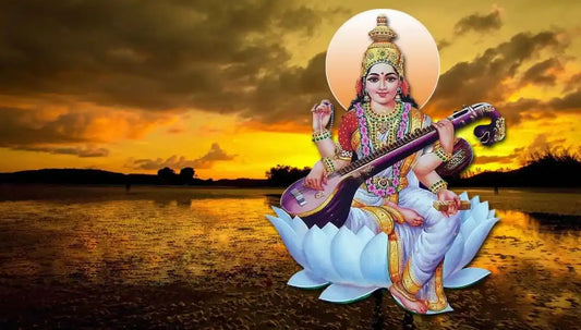 Goddess Saraswati with a veena surrounded by a sunset backdrop representing Yajnavalkya Saraswati Stotram