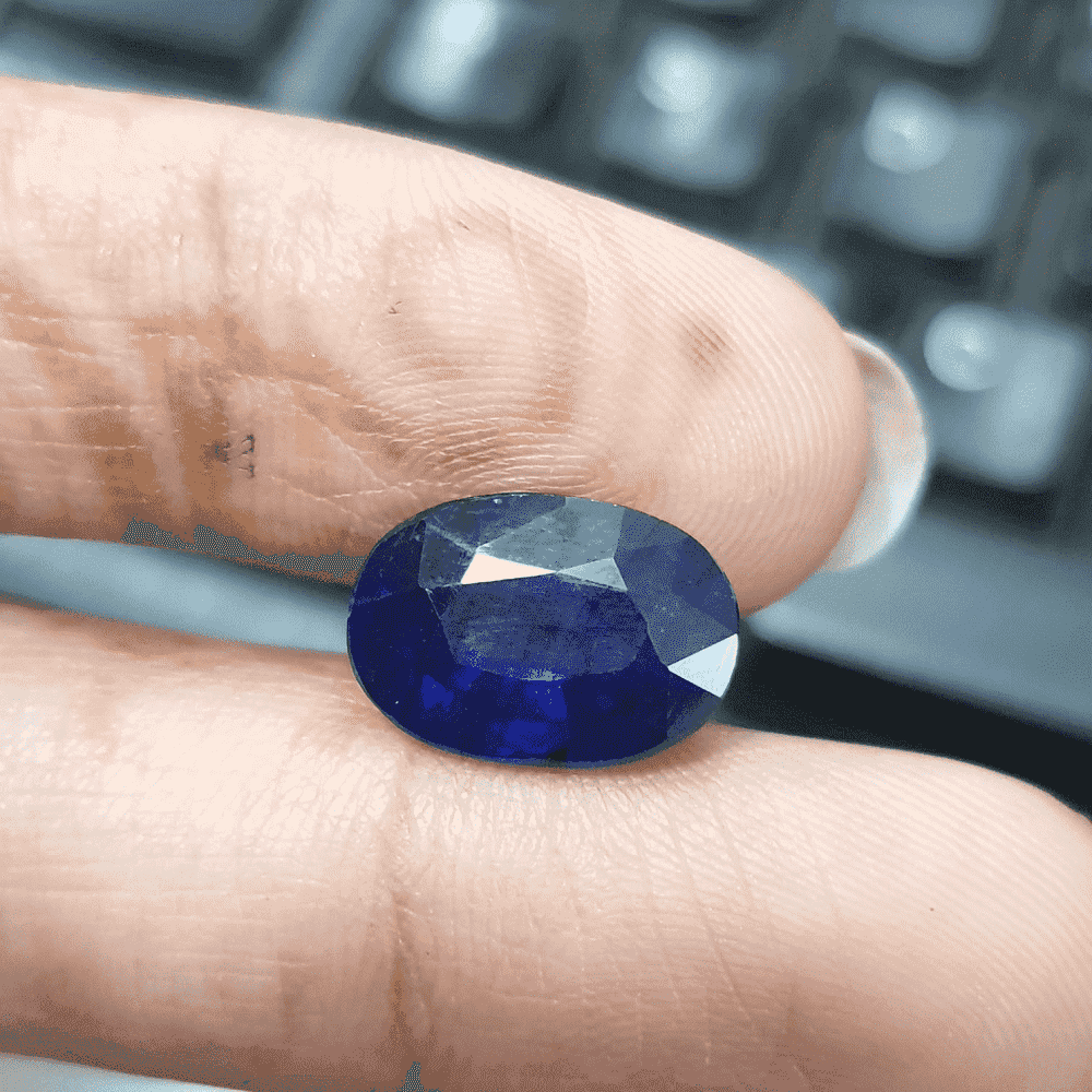 Hand-Held Blue Sapphire Stone with Deep Blue Color and Faceted Cut for Jewelry Making