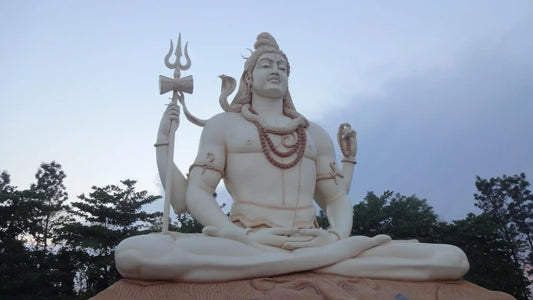 Majestic statue of Lord Shiva, symbolizing tranquility, representing Shri Gaurisha Ashtakam in serene surroundings