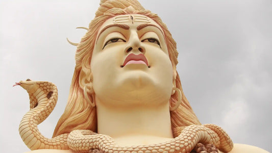Majestic statue of Lord Shiva with a serpent, symbolizing Somwar Ki Aarti significance