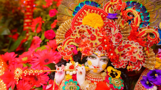 Colorful depiction of deity with flowers and vibrant decorations, representing Shri Yashodalala Aarti