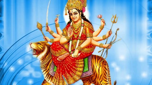 Goddess Durga depicted riding a tiger, symbolizing power and strength, related to Navadurga Stotram