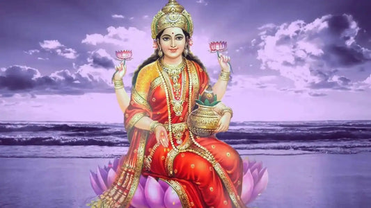 Image of Goddess Lakshmi sitting on a lotus holding flowers, representing Shri Suktam Paath.