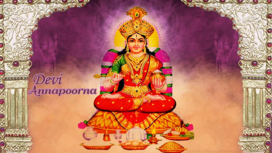 Illustration of Devi Annapoorna adorned in traditional attire with Shri Annapurna Mata Chalisa text