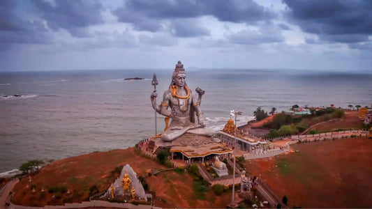 Aerial view of the majestic Shiva Dwadashajyotirlinga Stotram statue by the sea
