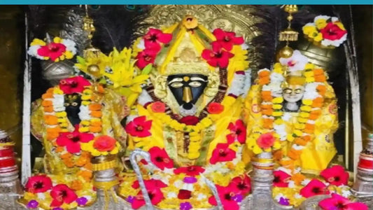 Idol of Bagalamukhi Mata Aarti adorned with flowers and decorations for worship