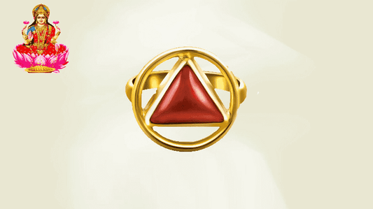 Gold ring featuring a triangular red coral gemstone emphasizing its benefits in jewelry and wellness