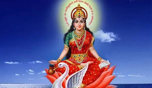 Shri Gayatri Mata Aarti depiction with goddess seated on a lotus and swan under a blue sky