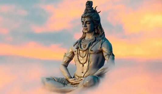 Statue of Lord Shiva Meditating Against a Colorful Sky with Shri Shiva Chalisa Theme