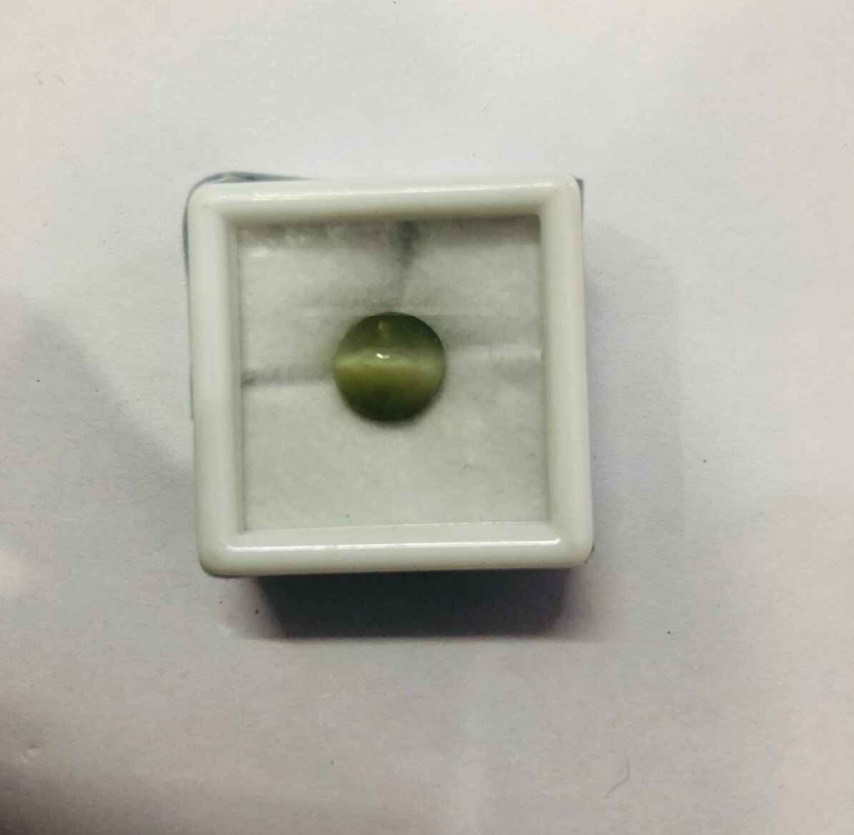 Natural Cat's Eye gemstone in a display box, ideal to buy Cat's Eye gemstone online for jewelry making