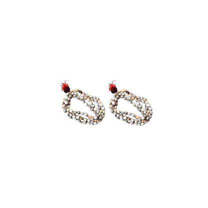 Original Vaijanti Mala made of natural beads with a vibrant red tassel for spiritual practices